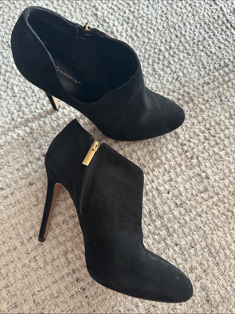 BCBG black scalloped high heel booties